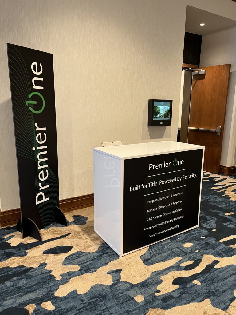 Branded Blanc registration counter, the kind of custom piece a McCormick Place EAC furniture vendor supplies