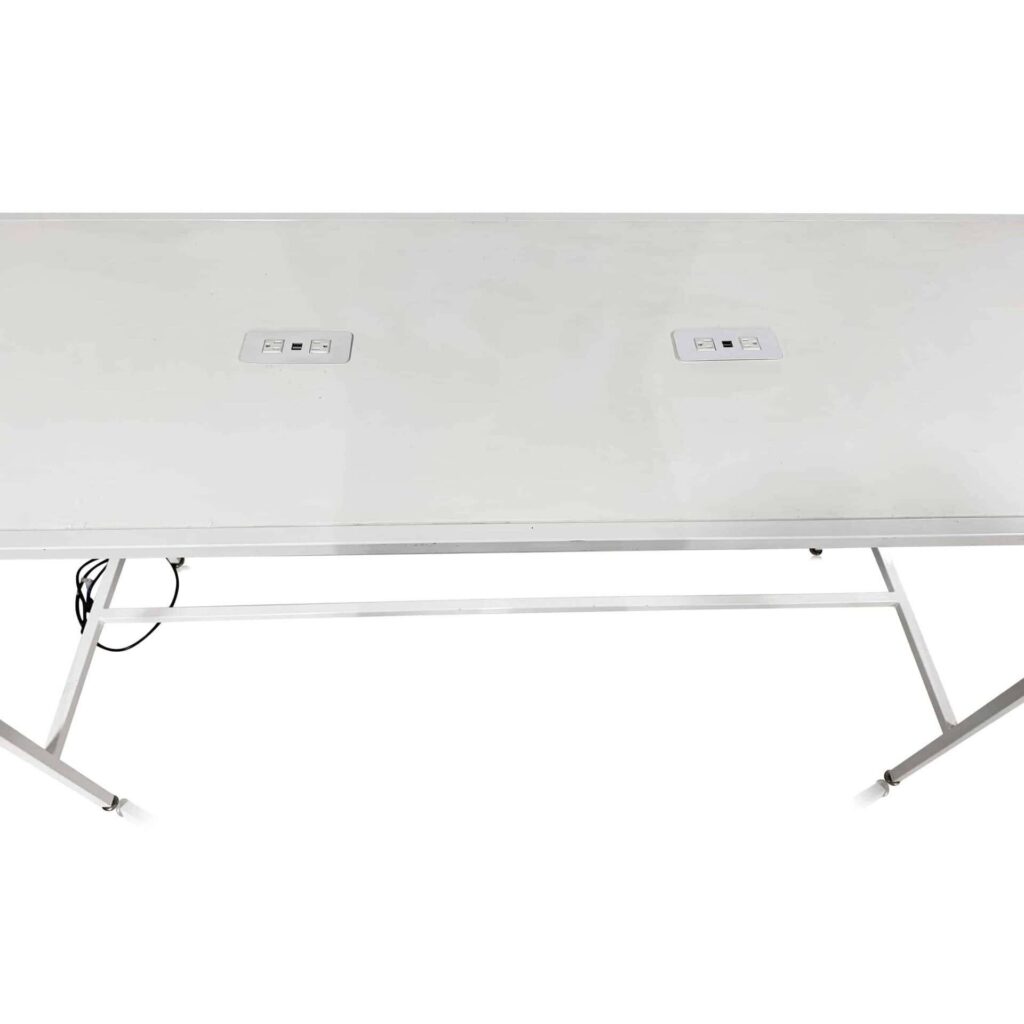 Spark powered communal table with built-in charging, a practical piece of AHR Expo booth furniture